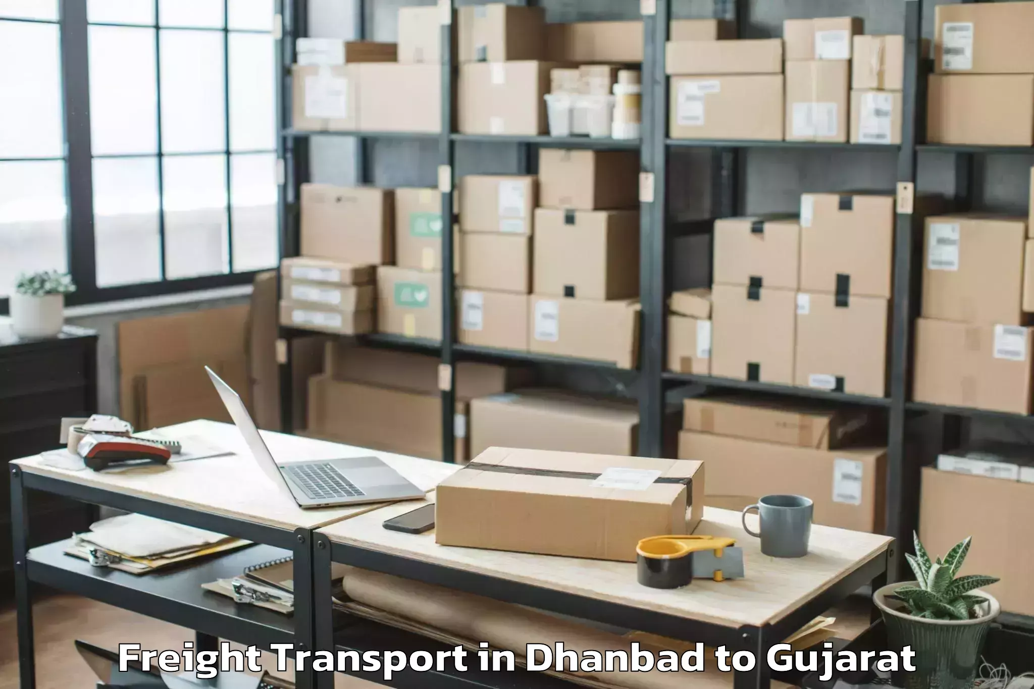 Get Dhanbad to Vaghodia Freight Transport